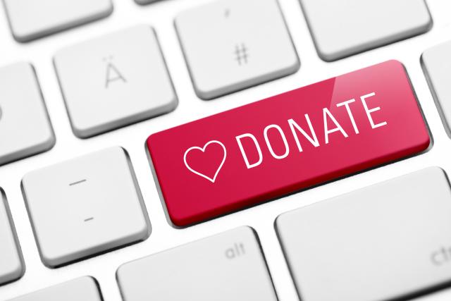 A keyboard with a button that says Donate