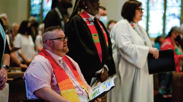 several people wearing stoles take part in the moderator's installation ceremony