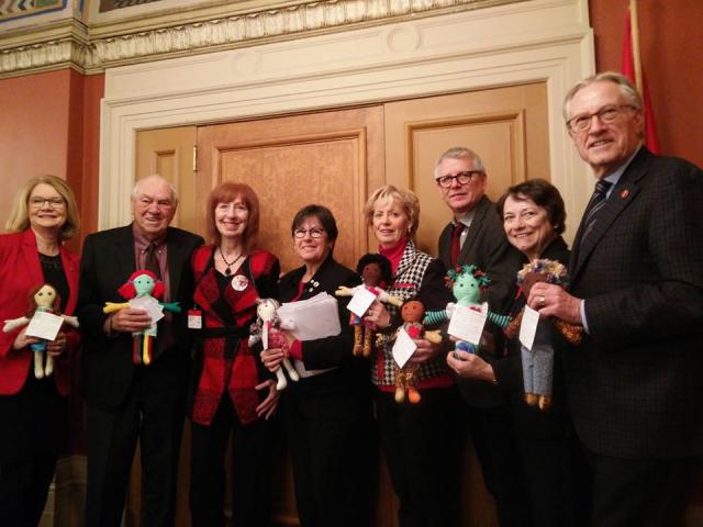 Senators and MPs with their Dolls of Hope