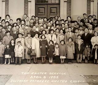 A large photo of the congregation of Southern Japanese United Church, Easter 1953, gathered on the steps of the church. Everyone is dressed in suits and dresses for the occasion.