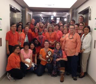 The United Church General Council staff gather in orange shirts, marking Orange Shirt Day which remembers the children who attended Residential Schools. 