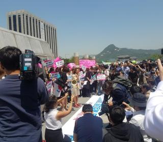 Participants in WomenPeaceKorea hold a press conference in Seoul.