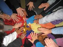 Hands together in a circle