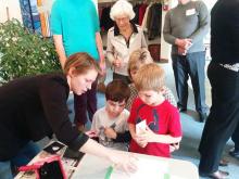 After being told the story of Jesus in the desert, children make Zen-style gardens at a Worship for the Child Within service at Castlegar United Church.