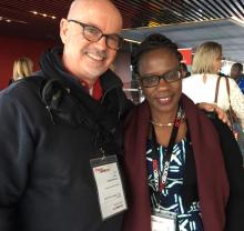 Dan Benson with Josephine Oguta at ACT Alliance meeting