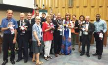 Dolls presented to London Council as reminder of child poverty.