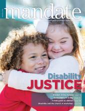 The cover of the Spring 2019 issue of Mandate magazine shows to young girls joyfully hugging, one White, one biracial; one with Down Syndrome, one with no visible disability.