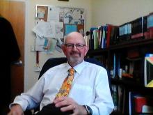 The Rev. Myles Vardy enjoys a rare quiet moment in his office at St. Paul’s United Church in Deer Lake, Newfoundland.