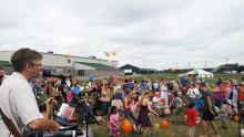 Balloons were shared at the closing worship service at the Skylight Festival.