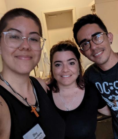 Three young university-age young people from the Student Christian Movement look at the camera for a selfie. One person is from Canada, the other two from Cuba.