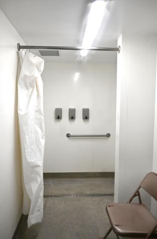 White-tiled shower stall