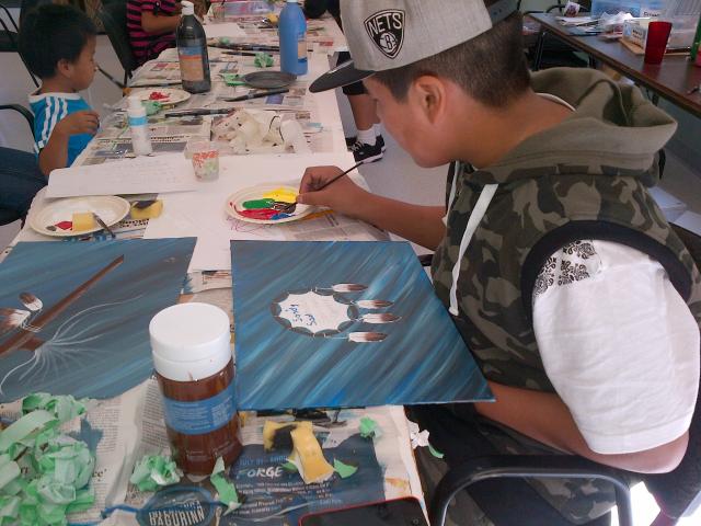 Neechi program, Winnipeg Child painting in the Neechi program
