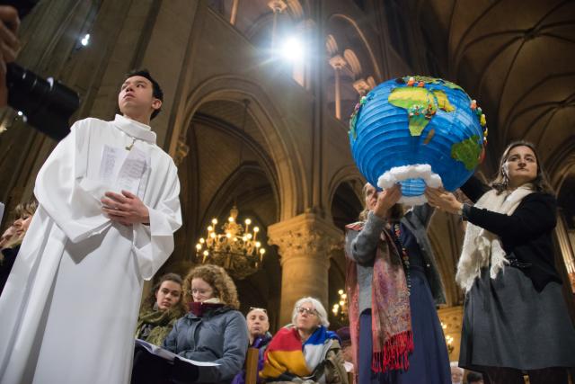 Religious leaders in ecumenical celebration for Creation at Notre-Dame Cathedral, Paris, during COP21 climate talks, 2015. Religious leaders during COP21 climate talks