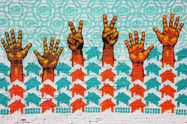 "Hands Up for Peace!" mural in St. Louis, Missouri. "Hands Up for Peace!" mural in St. Louis, Missouri.