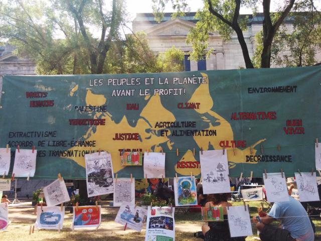 A banner at the 2016 World Social Forum in Montreal, QC. Another World is Needed! A banner at the 2016 World Social Forum in Montreal, QC.
